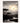 Silhouetted acacia trees along a winding river at golden sunrise with dramatic clouds and distant mountains in African