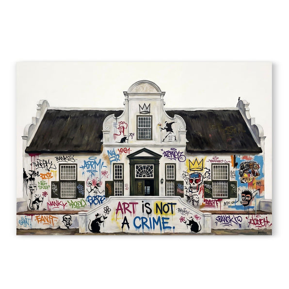 White Cape Dutch building covered in colorful graffiti tags and stencilled figures with text reading 'Art Is Not A Crime'