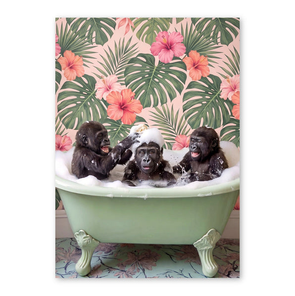 Three chimpanzees bathing together in a pale green bathtub filled with white bubbles, set against a pink background with